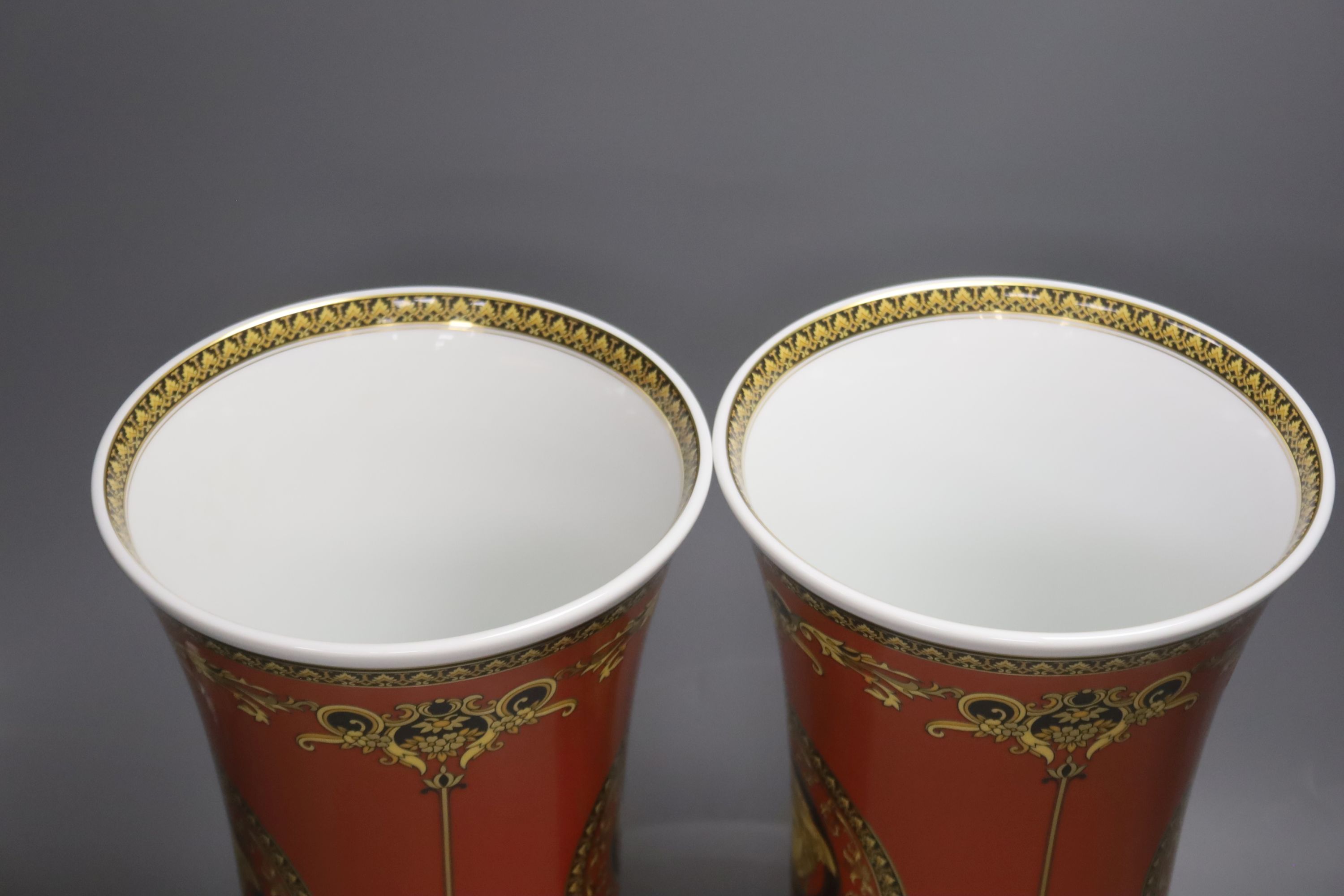 A pair of Rosenthal Versace 'Medusa Red' tapered vases, height 34cm H 34cm